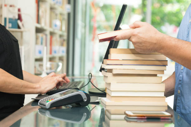 Customer buying books