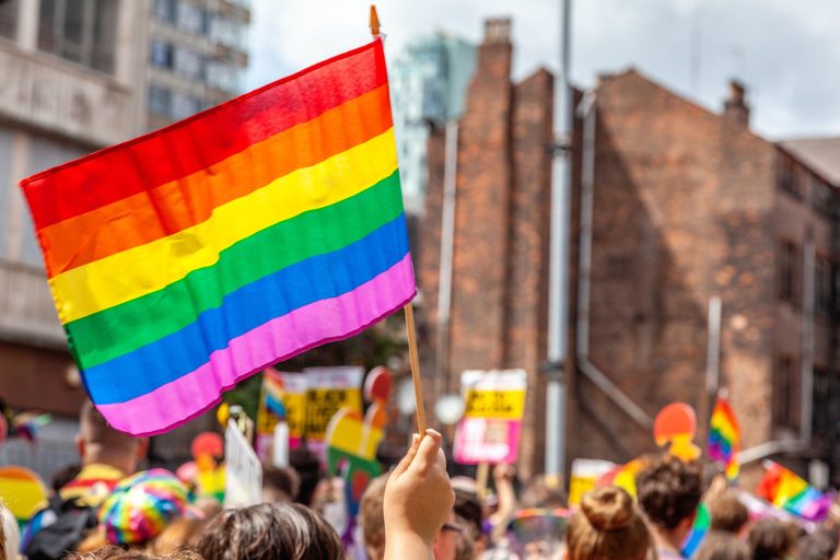 Pride parade flags with beautiful rainbow colors